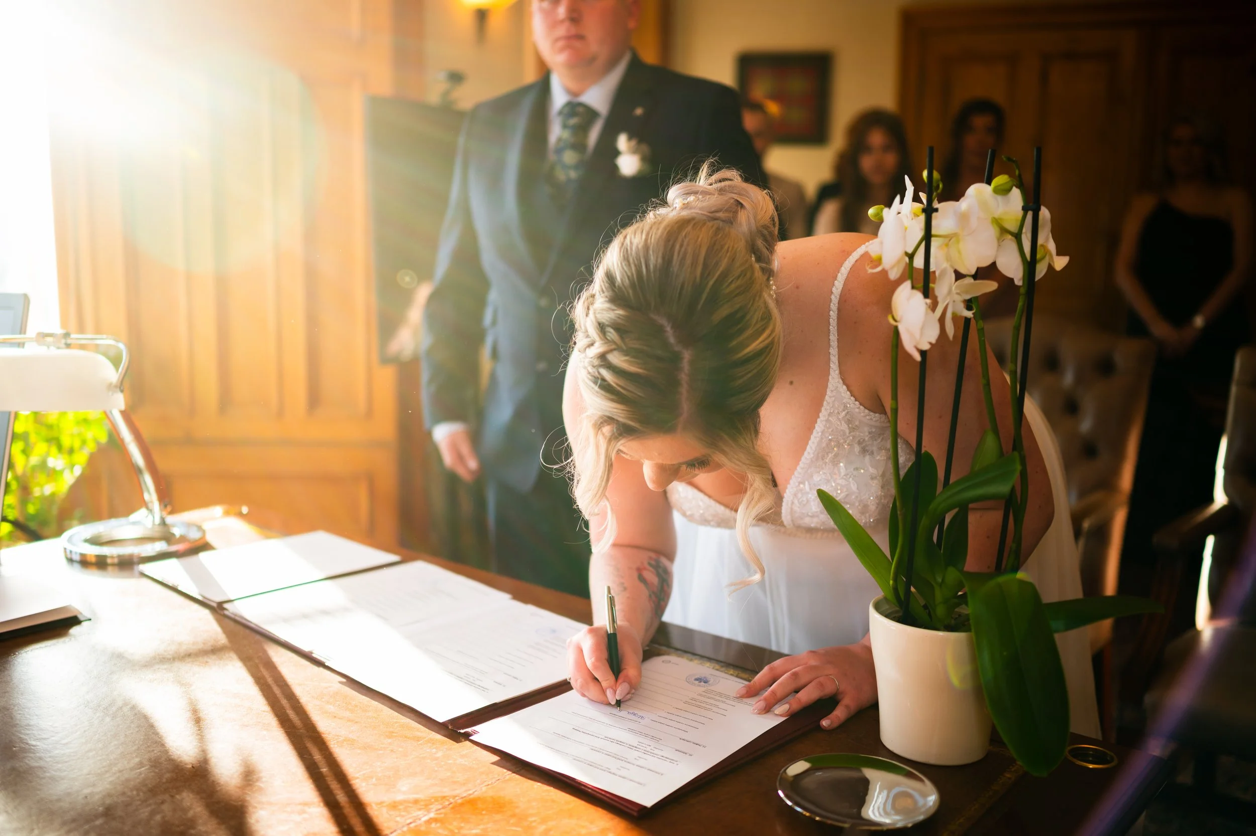 bride wedding ceremony signing papers
