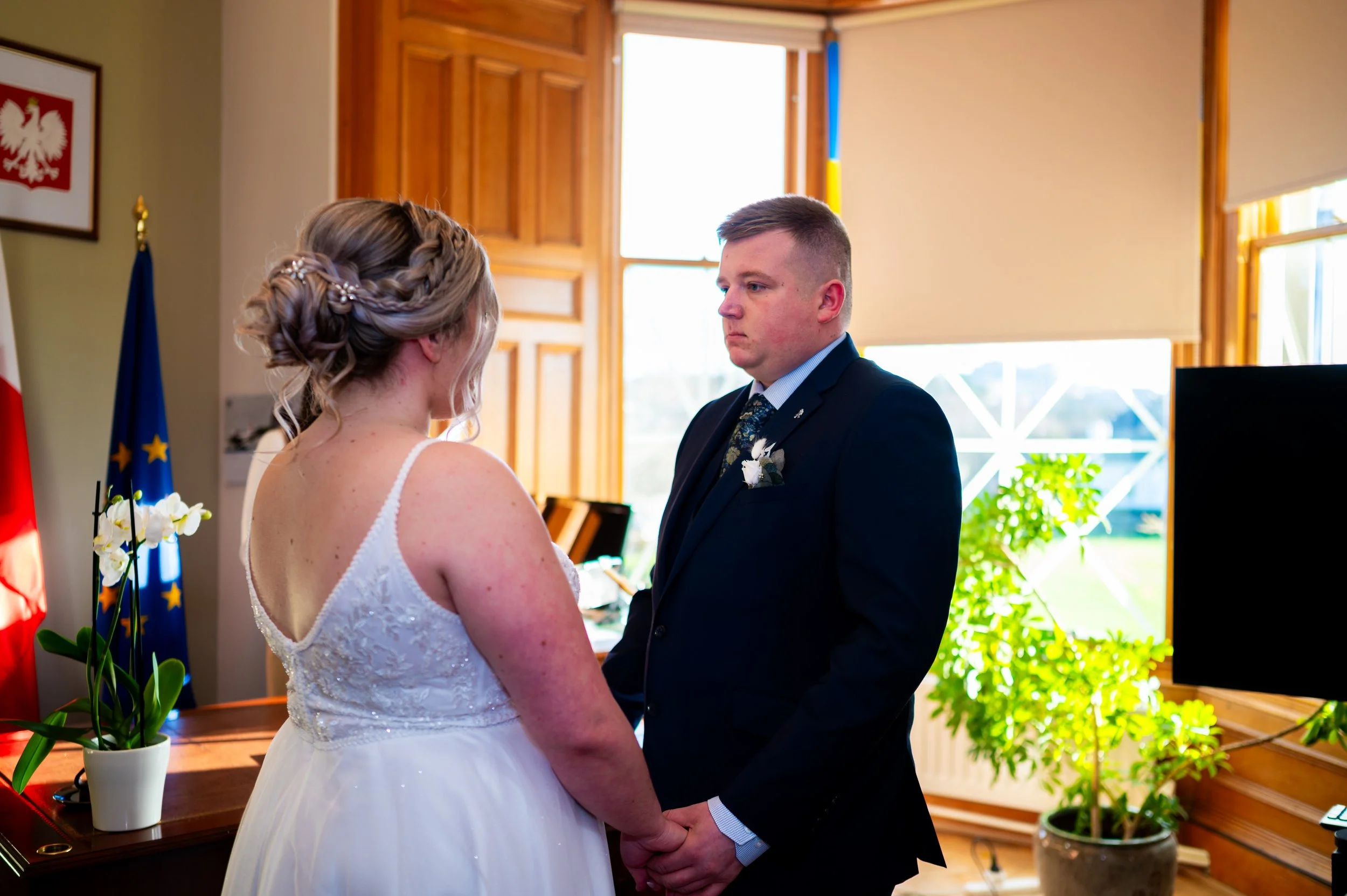 bride groom wedding ceremony holding hands