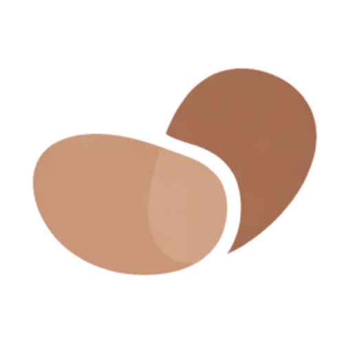 Two brown eggs, one with a slightly lighter shell, are placed on a surface.