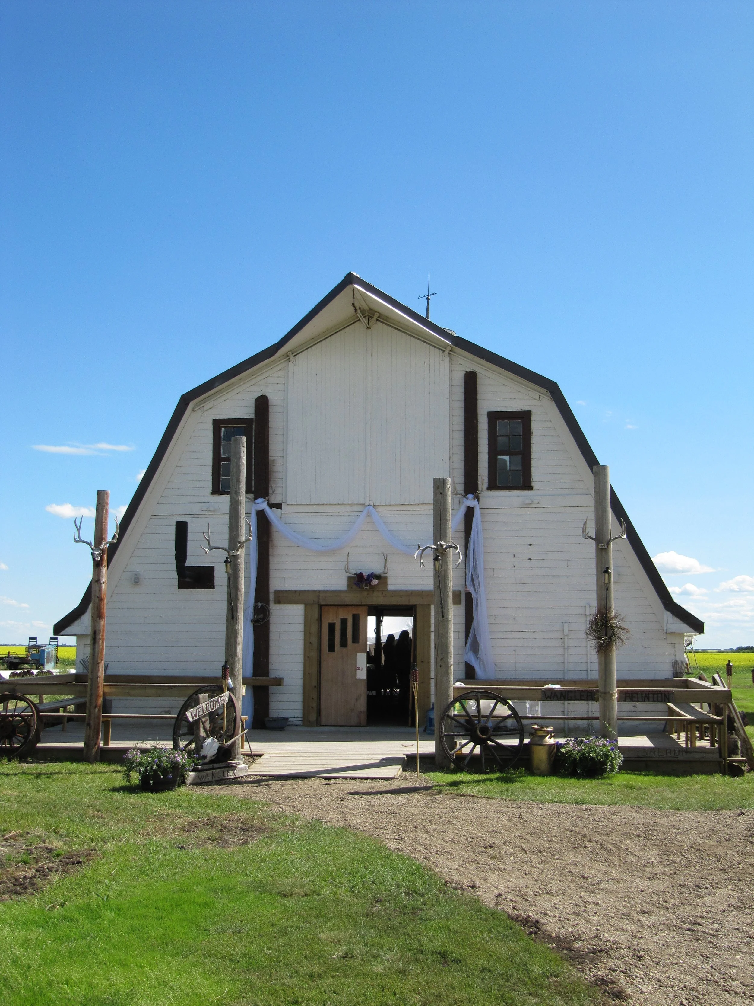 Front entrance of Top Gun Saloon's rustic barn venue near Wilkie, Saskatchewan