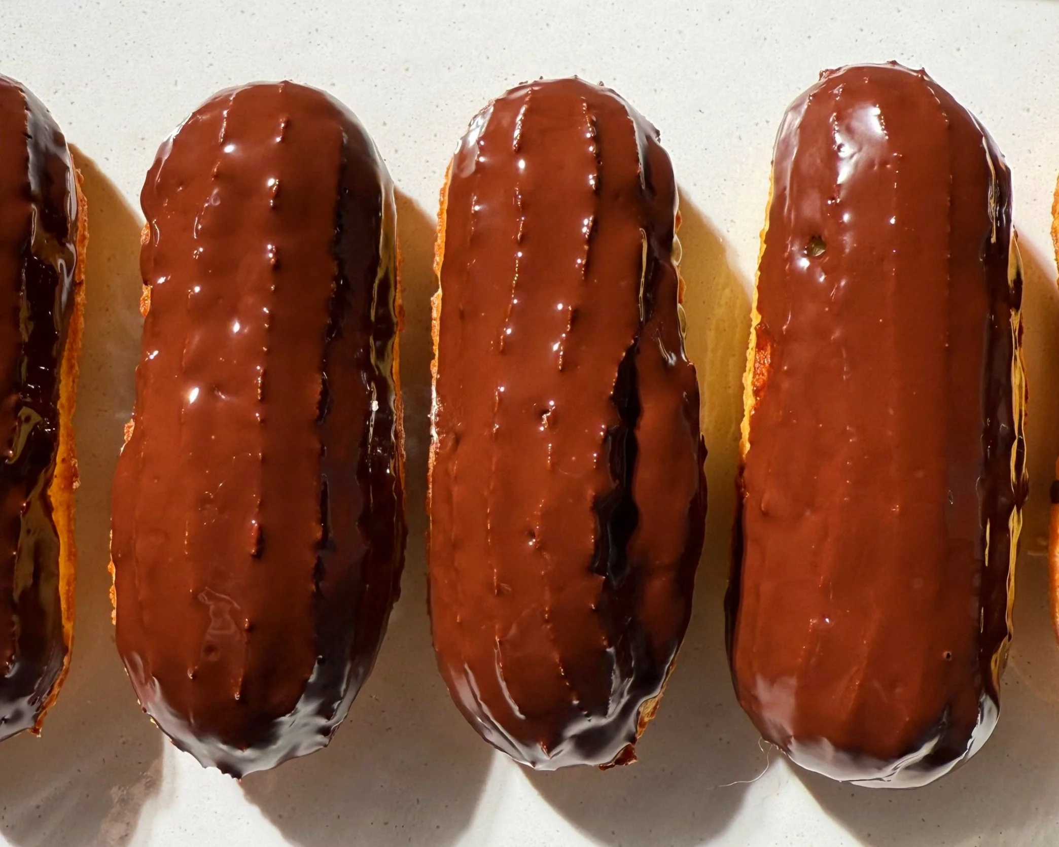 ECLAIRS WITH PEANUT BUTTER MOUSSE AND DARK CHOCOLATE GLAZE