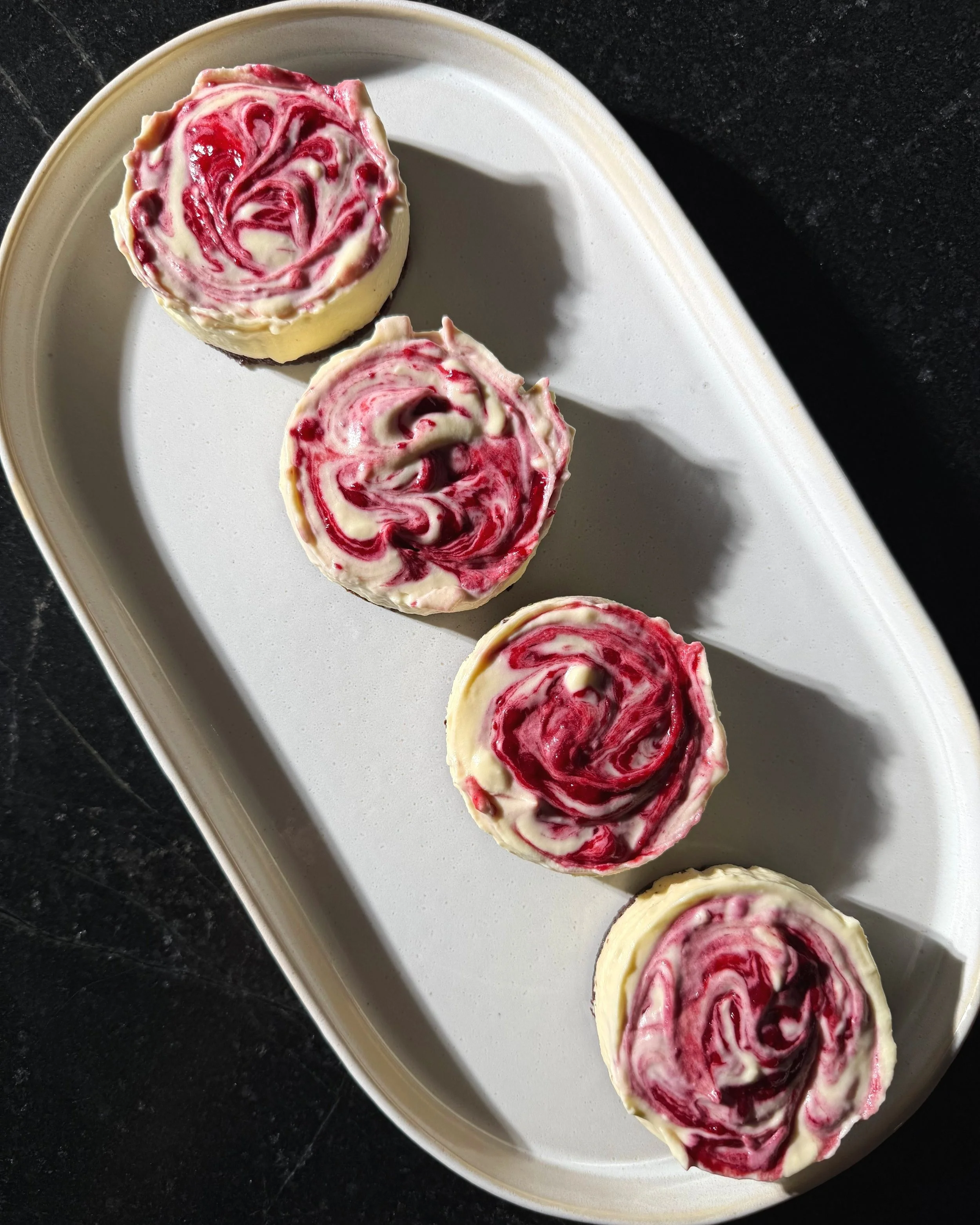 “NO-BAKE” WHITE CHOCOLATE  RASPBERRY CHEESECAKE WITH CHOCOLATE BISCUIT CRUST