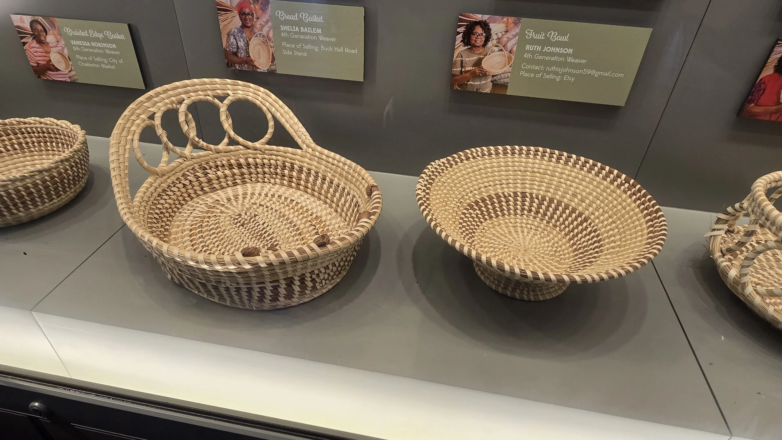Handwoven Gullah sweetgrass baskets displayed in a Charleston, South Carolina museum near the cruise port