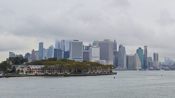 Lower Manhattan skyline viewed from New York Harbor near the Brooklyn Cruise Terminal in Red Hook, New York