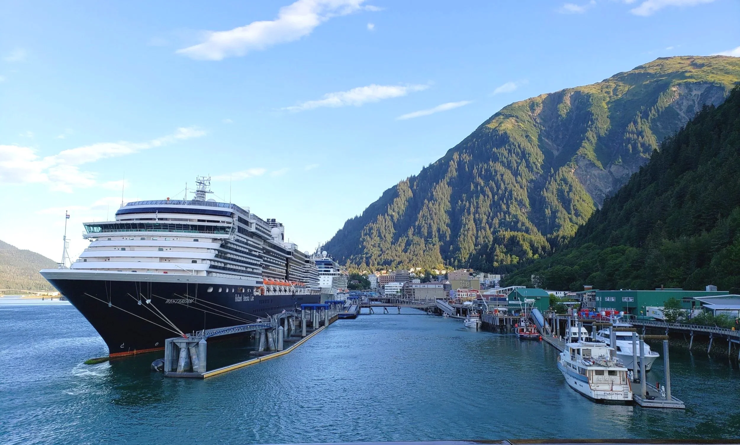 View of AJ Dock at the Juneau, Alaska cruise port, a cruise ship docking area with a free shuttle to downtown Juneau and the waterfront