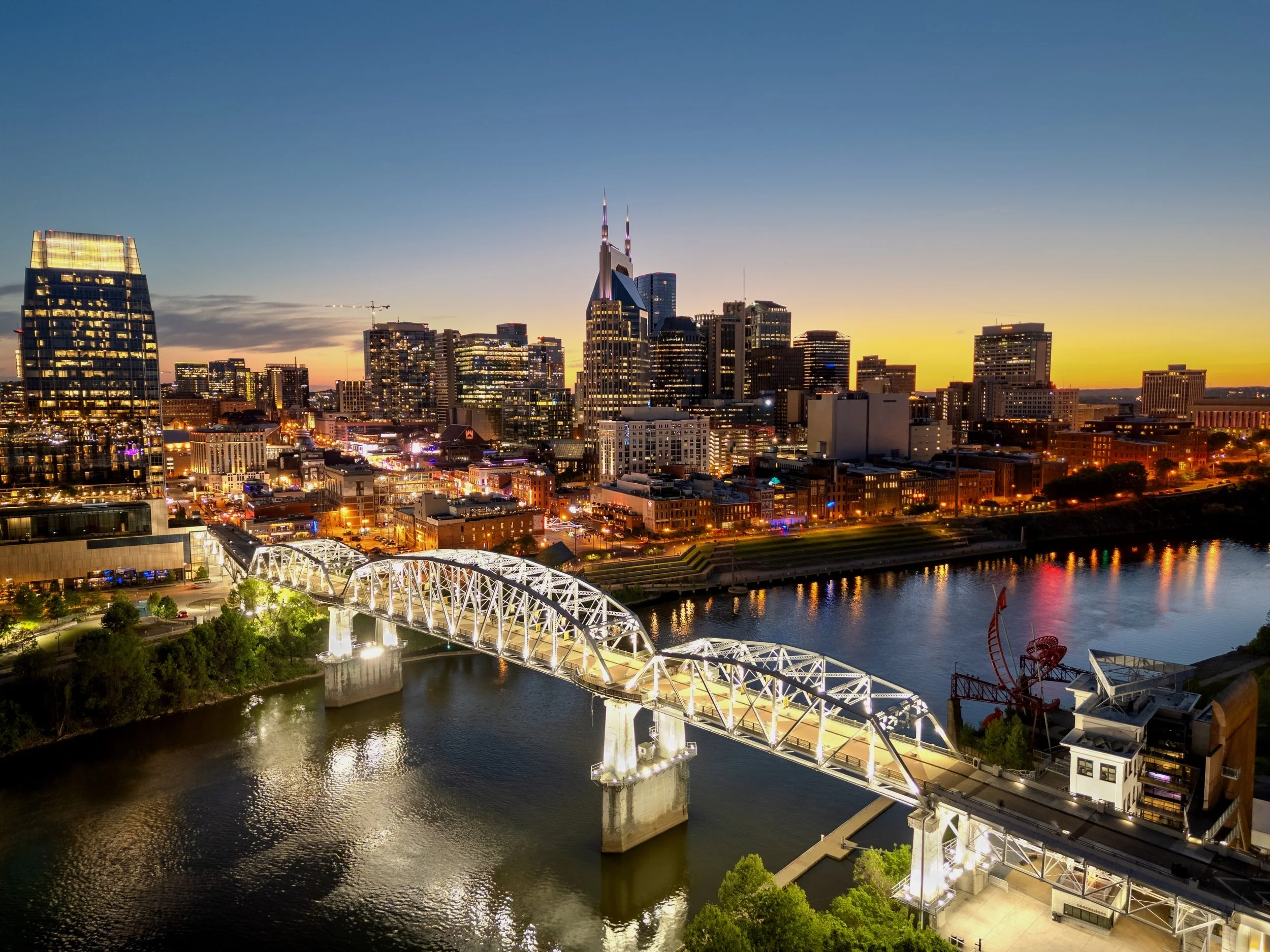 nashville-tennessee-usa-skyline-over-the-cumberl-2024-05-23-21-28-04-utc.jpg
