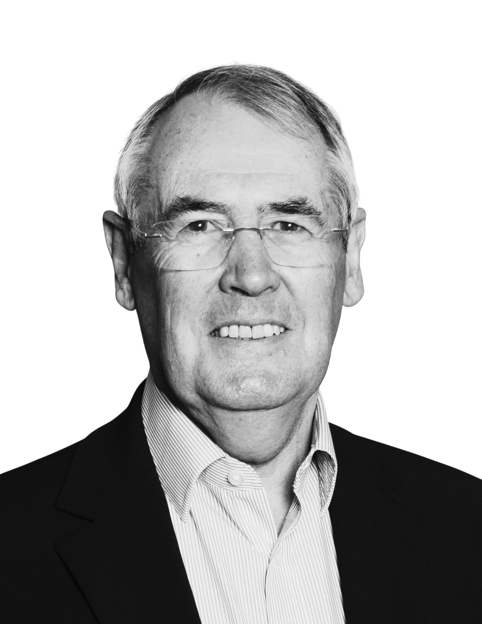 Black and white professional headshot of an older man with short hair, glasses, wearing a suit and collared shirt, smiling slightly.