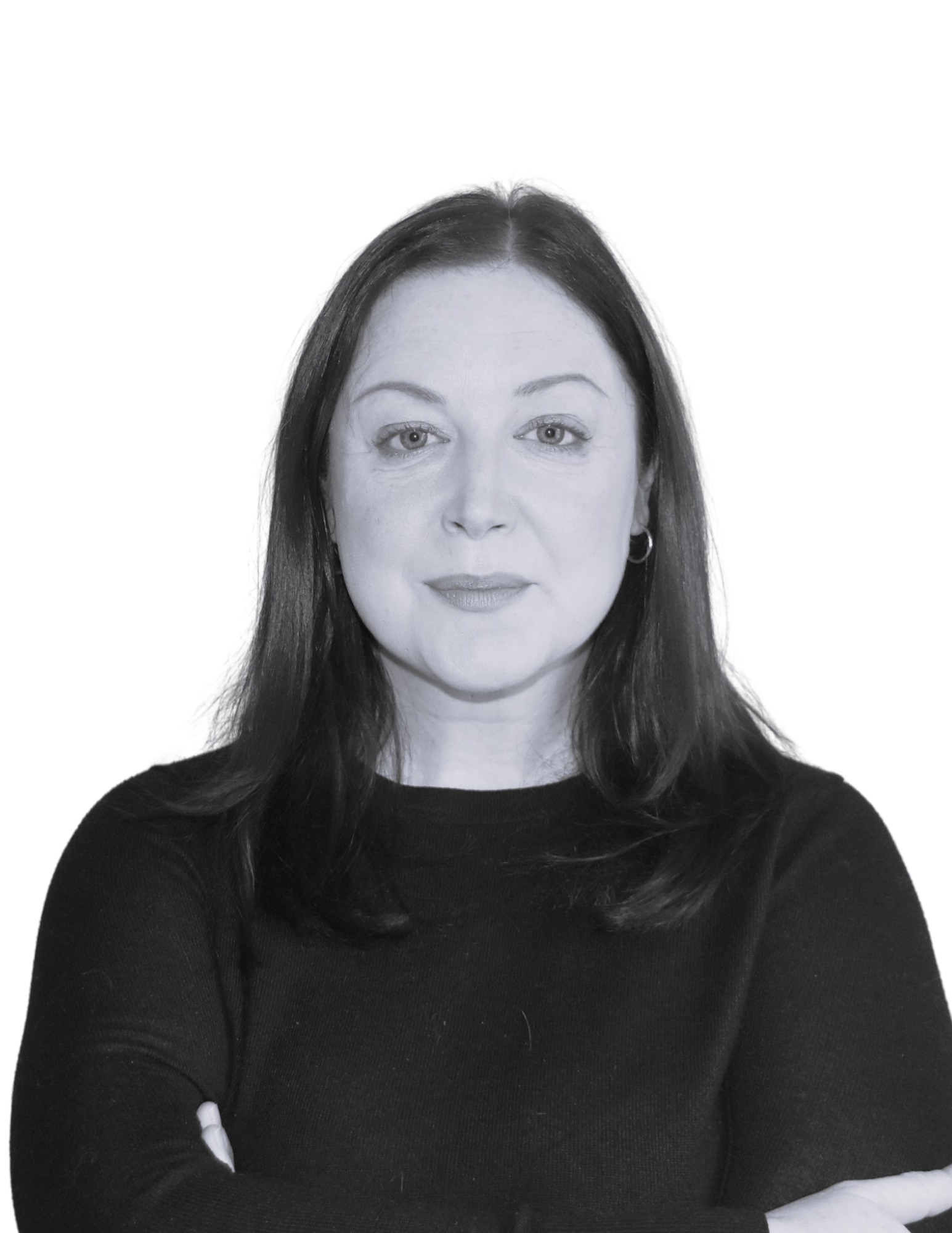 Black and white portrait of a woman with shoulder-length dark hair, wearing a black top, with arms crossed, against a plain white background.