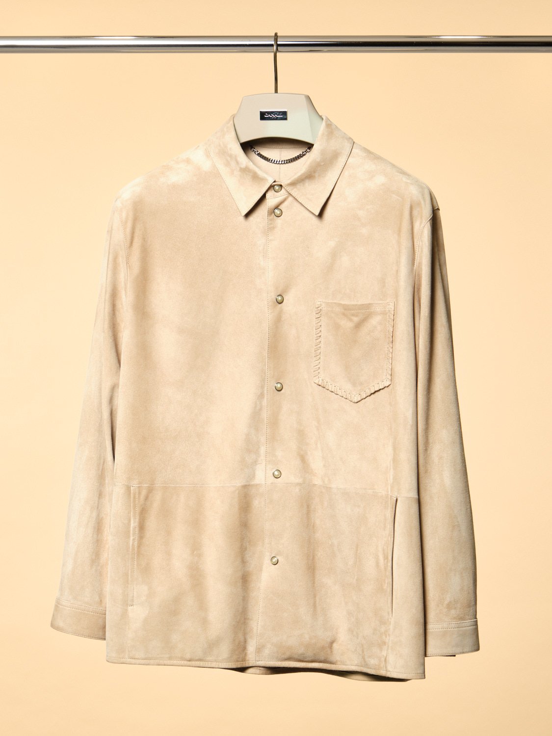 4. Tan suede overskirt