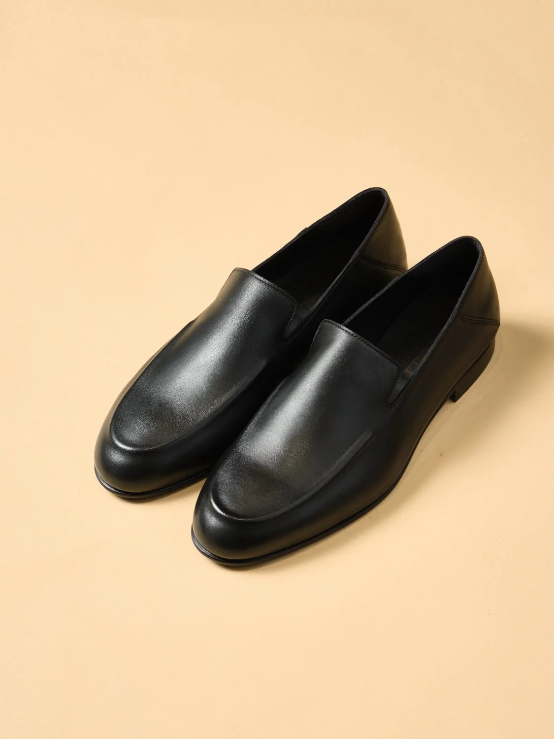 15. Black Calfskin Slip On