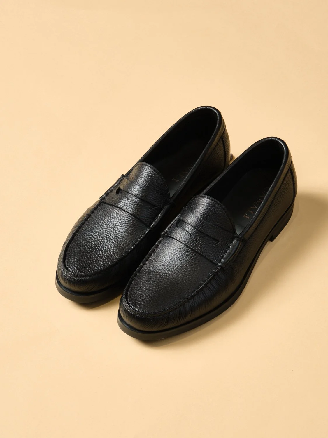 Black calfskin penny loafer $1095