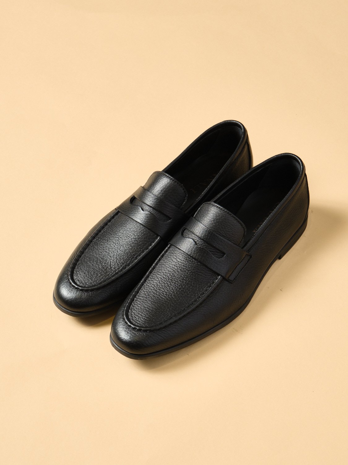 14. Black Calfskin Slip On