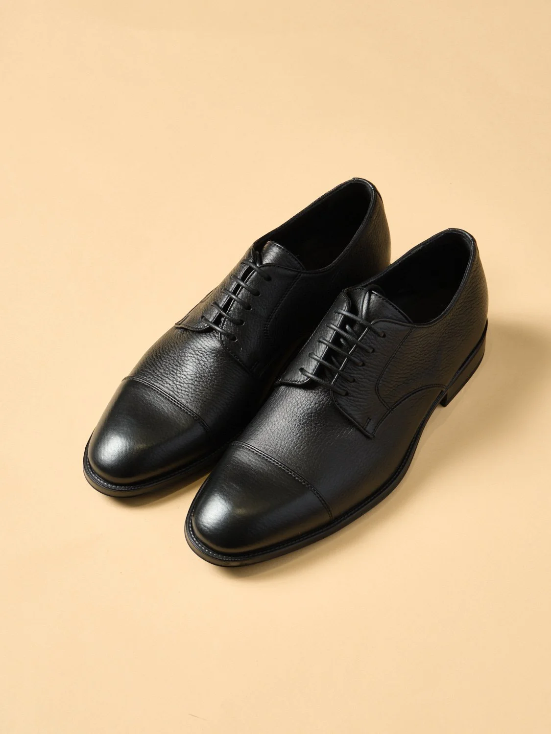 6. Black Deerskin lace up with synthetic sole