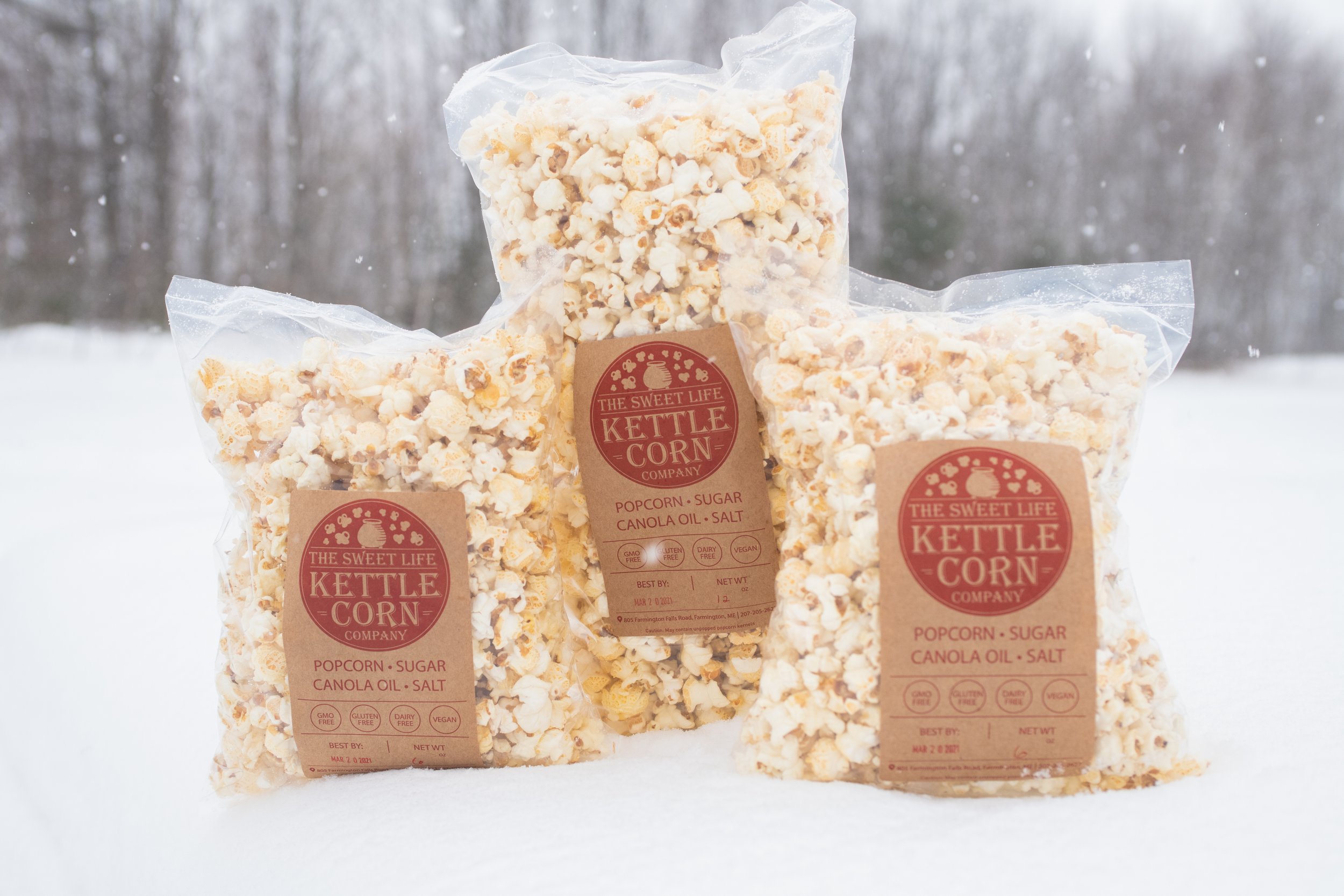 Erica 3 bags of popcorn.jpg