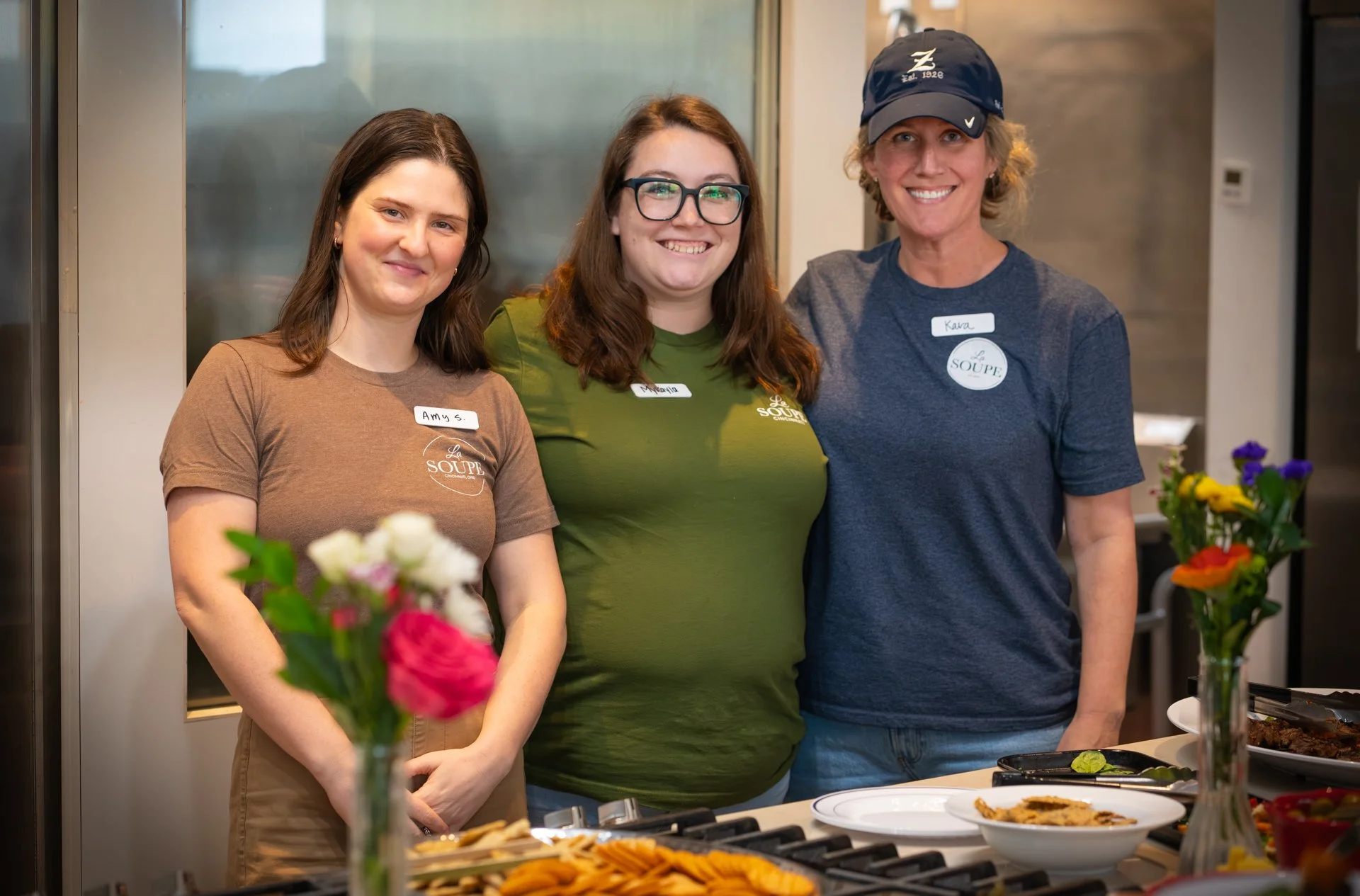 From left to right: Amy Scarpello – Senior Director, Rescue Share & Volunteer Engagement. Mykayla Kroeger – Director of Volunteer Engagement. Kara Behling – Volunteer Engagement Assistant.