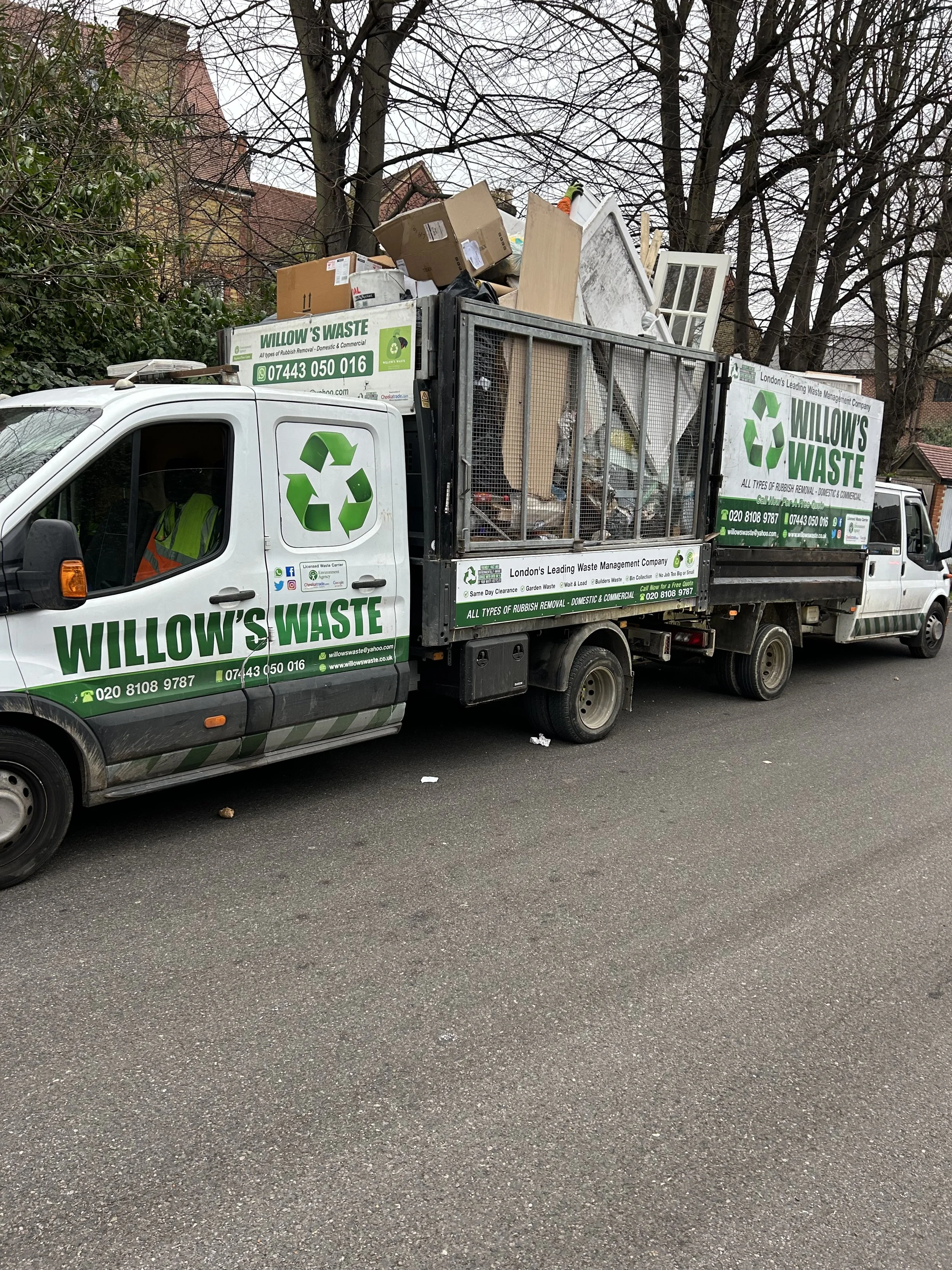 Rubbish clearance van with builders waste and household waste from a collection in Clapham London WILLOWS WASTE tipper van collecting waste from London