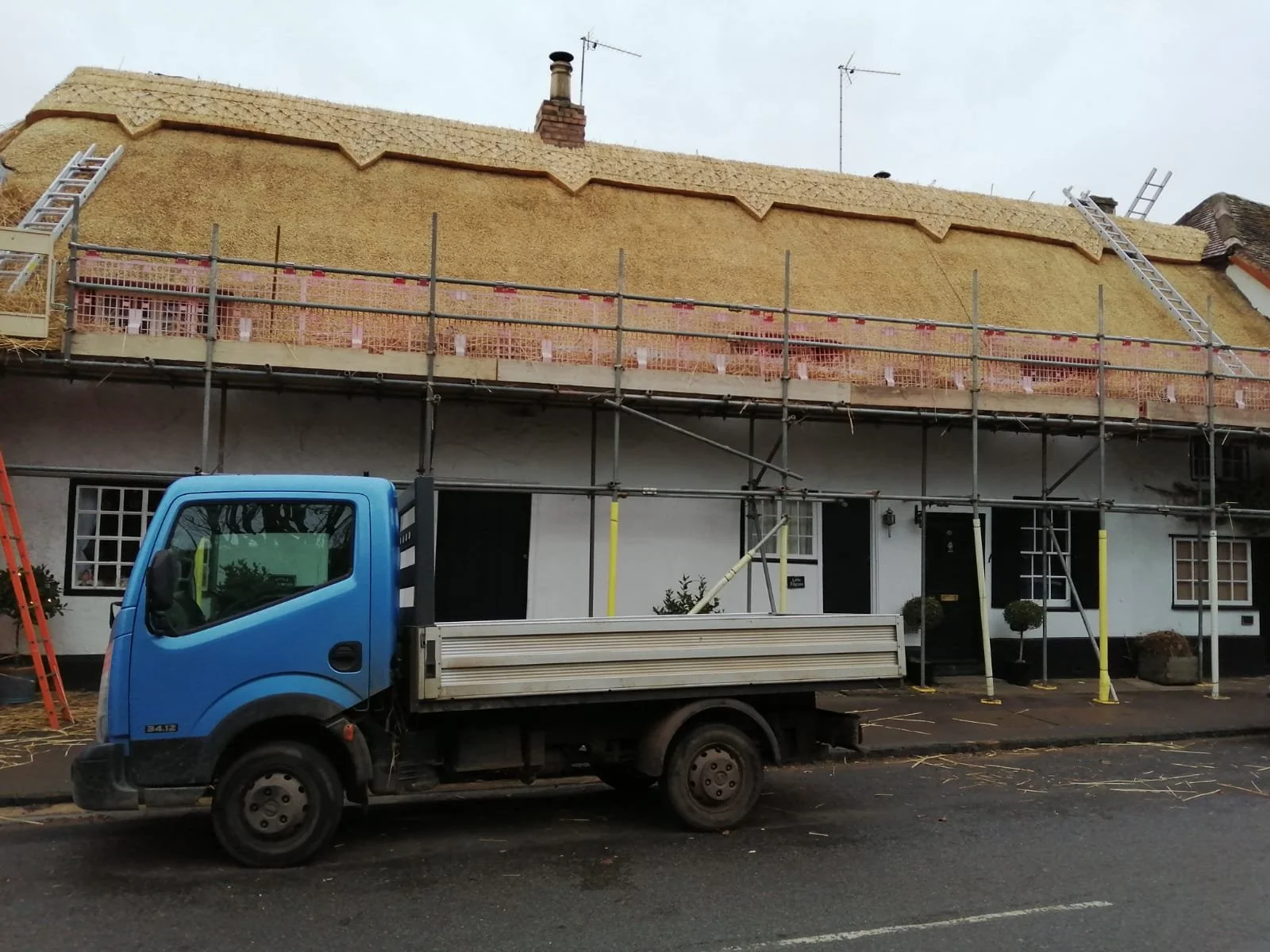A house being thatched