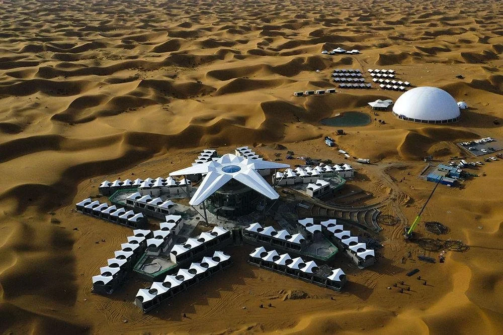 China’s Microbes Make Deserts Bloom Fast.