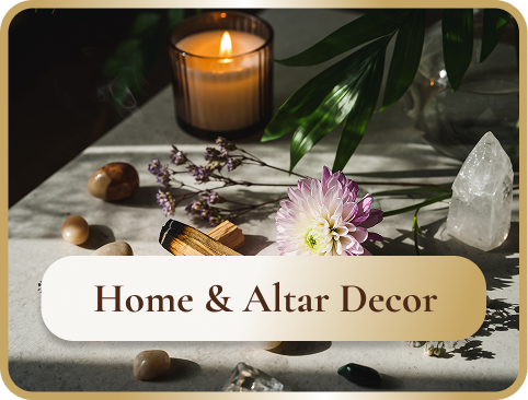 A candle, flowers, and crystals arranged on a table with a sign that reads 'Home & Altar Decor'.