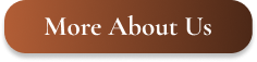 Brown button with white text that says 'More About Us'