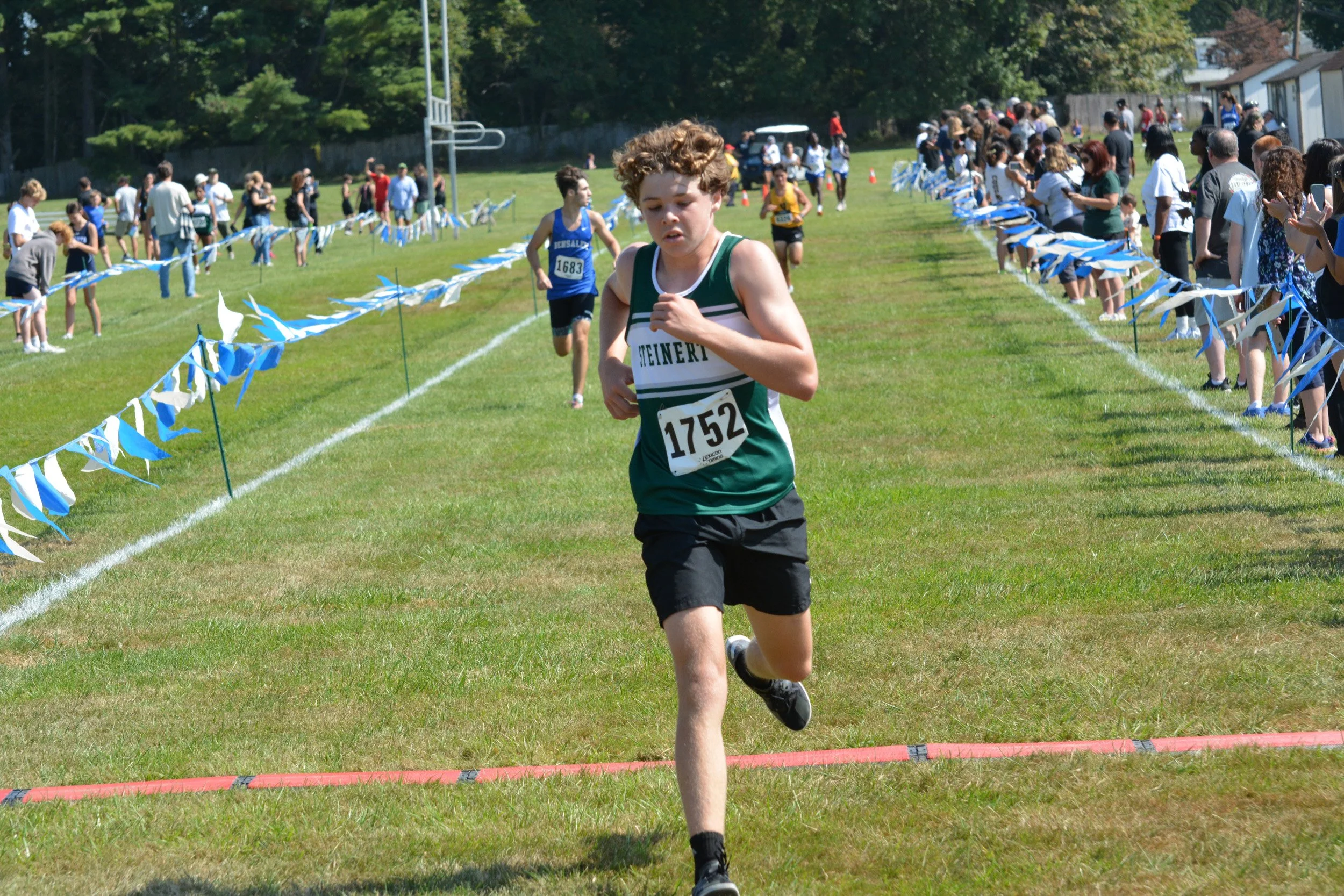 TCNJXCInvy2025_VarBoysFinish_Small-032.jpg