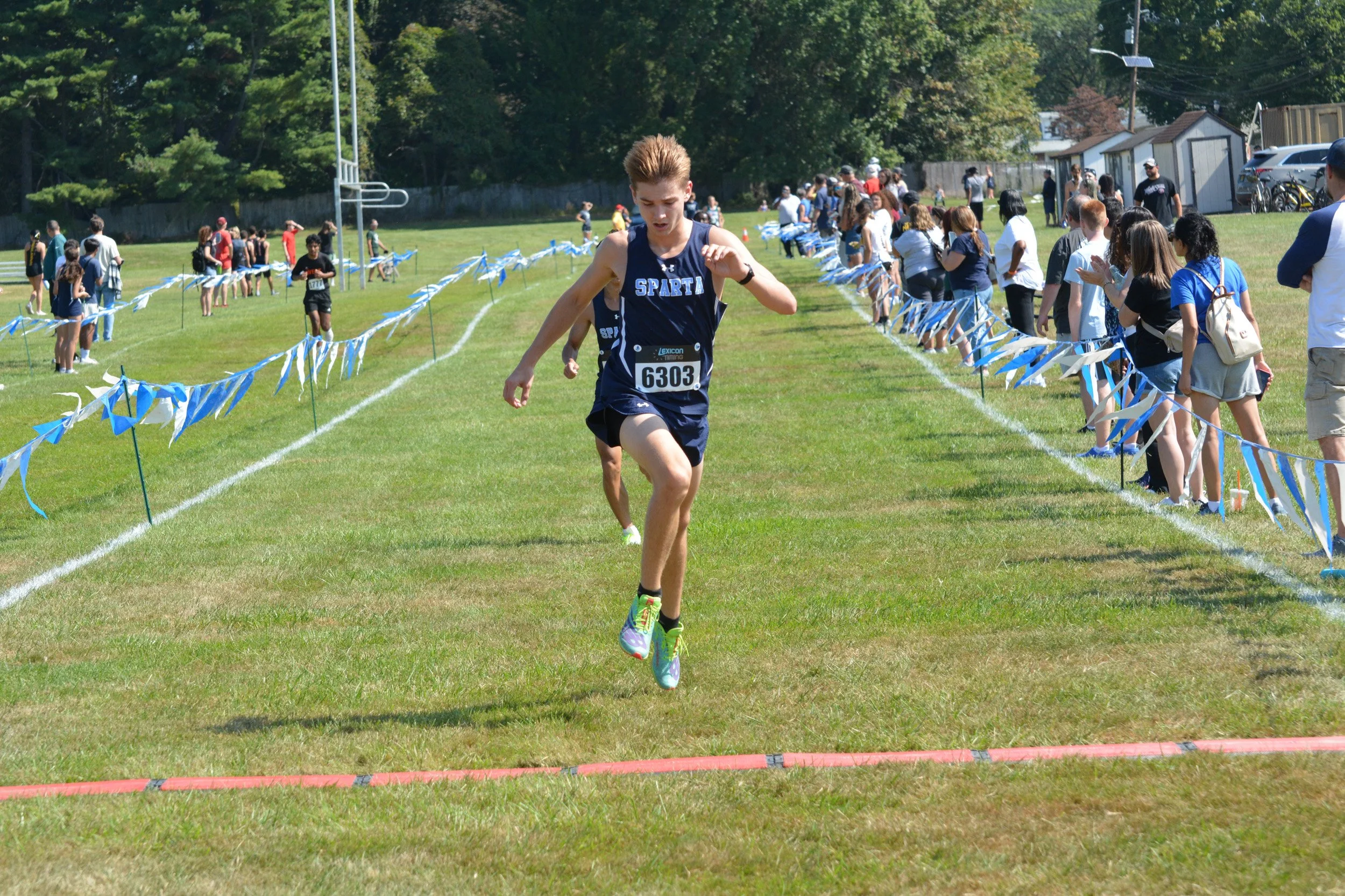 TCNJXCInvy2025_VarBoysFinish_Small-022.jpg