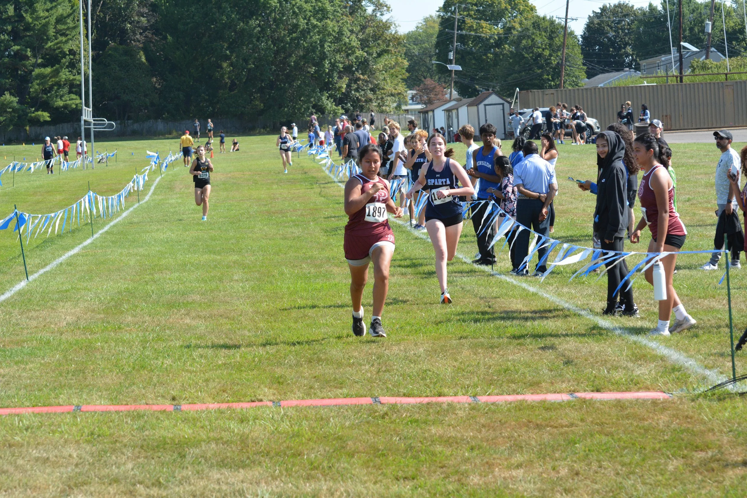 TCNJXCInvy2025_VarGirlsFinish_Small-73.jpg