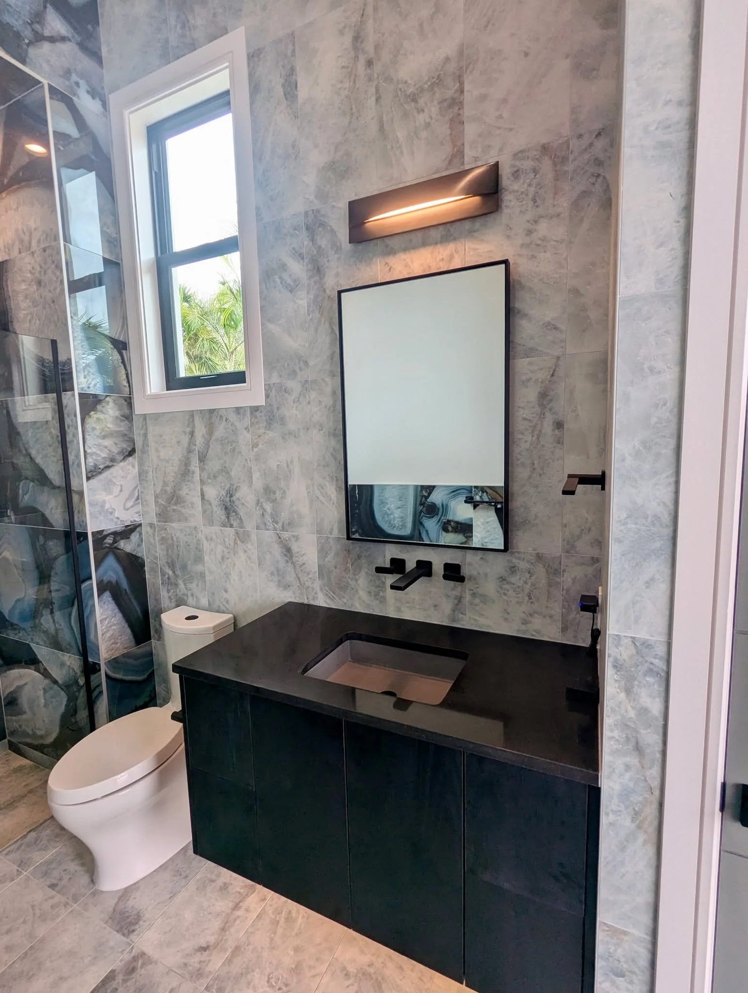 Transform your bathroom vanity with a mirror that fits perfectly.
At SK Glass, we specialize in crafting custom cut mirrors. While we don&rsquo;t furnish frames, we can work with the frame you provide, build your mirror to size, and professionally ha
