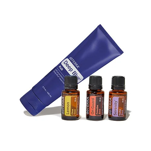Deep Blue rub tube and three essential oil bottles labeled Lemon, On Guard, and Serenity.
