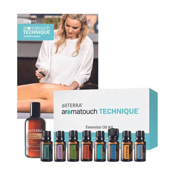 A woman performing an aromatherapy massage using essential oils from doTERRA, with a box labeled 'aromatch TECHNIQUE' and a set of small essential oil bottles in front.