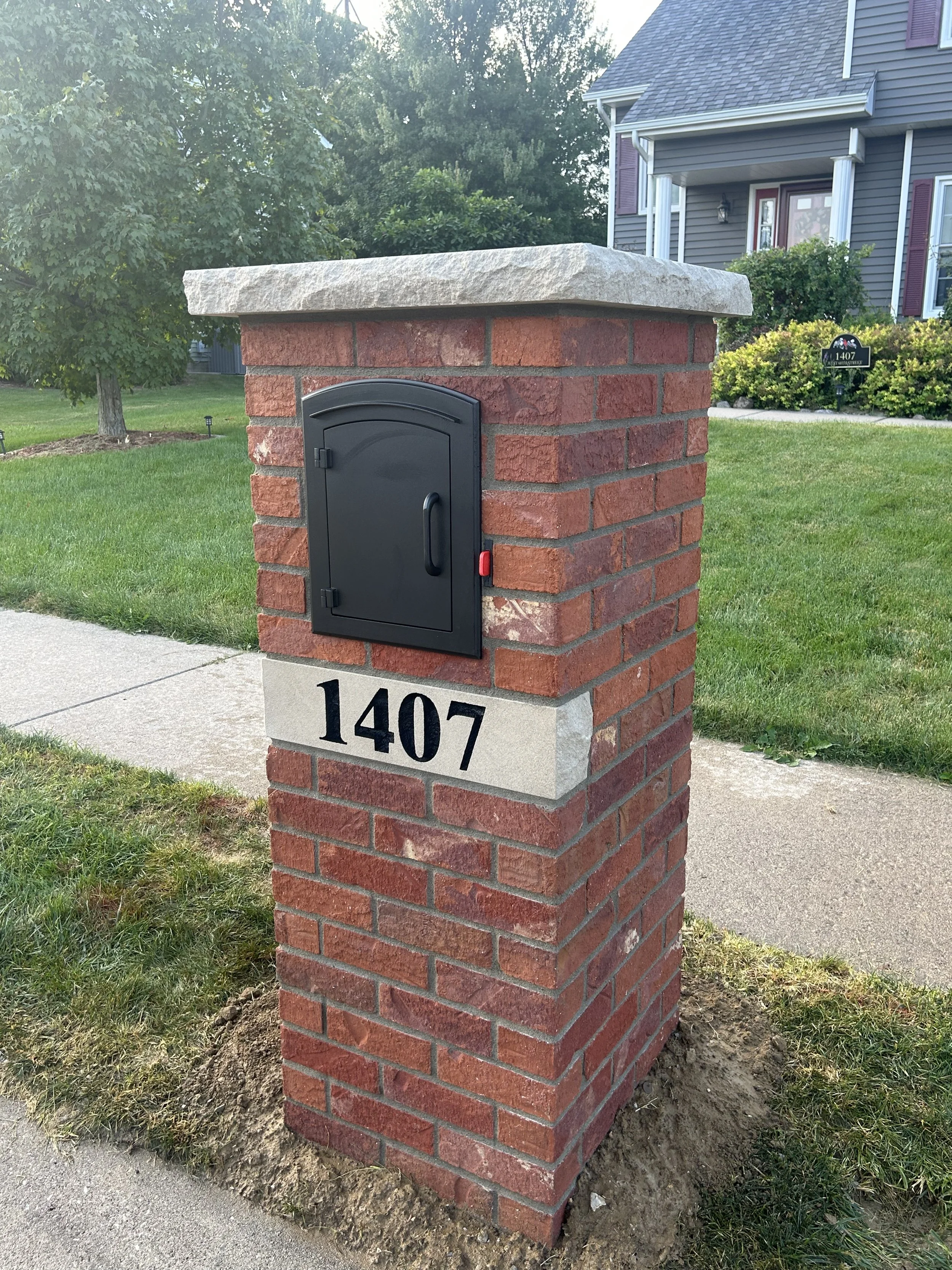 Custom brick mailbox installation in Eldridge Iowa by QC Mailbox Pro