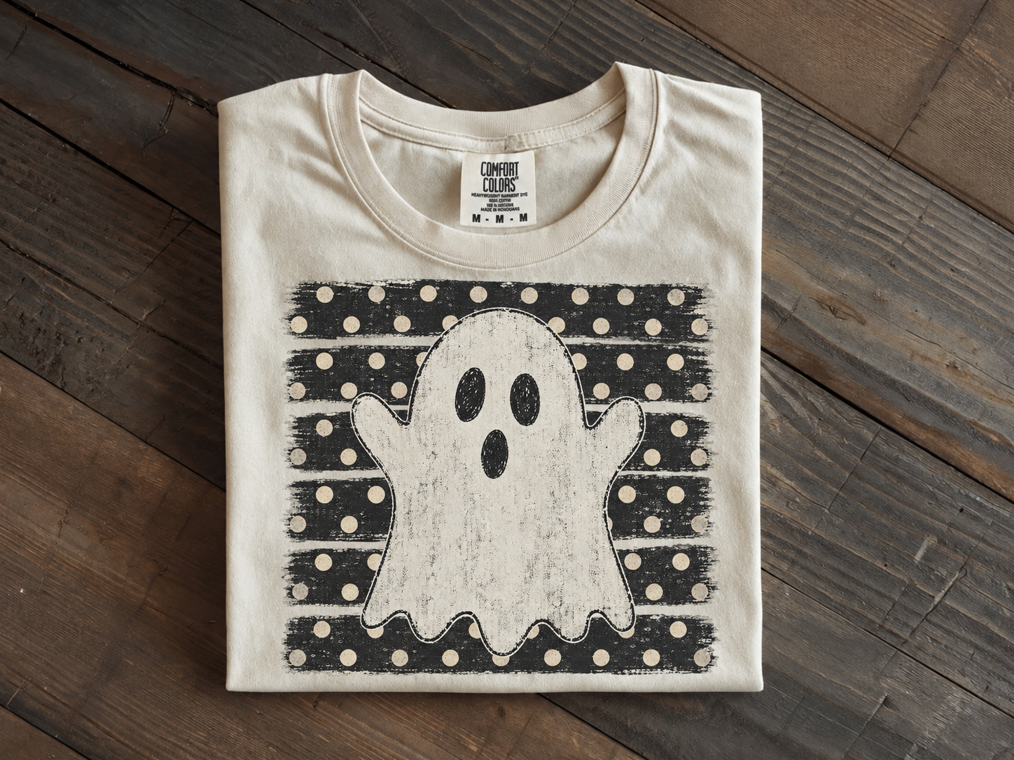 Distressed ghost print on ivory shirt.png