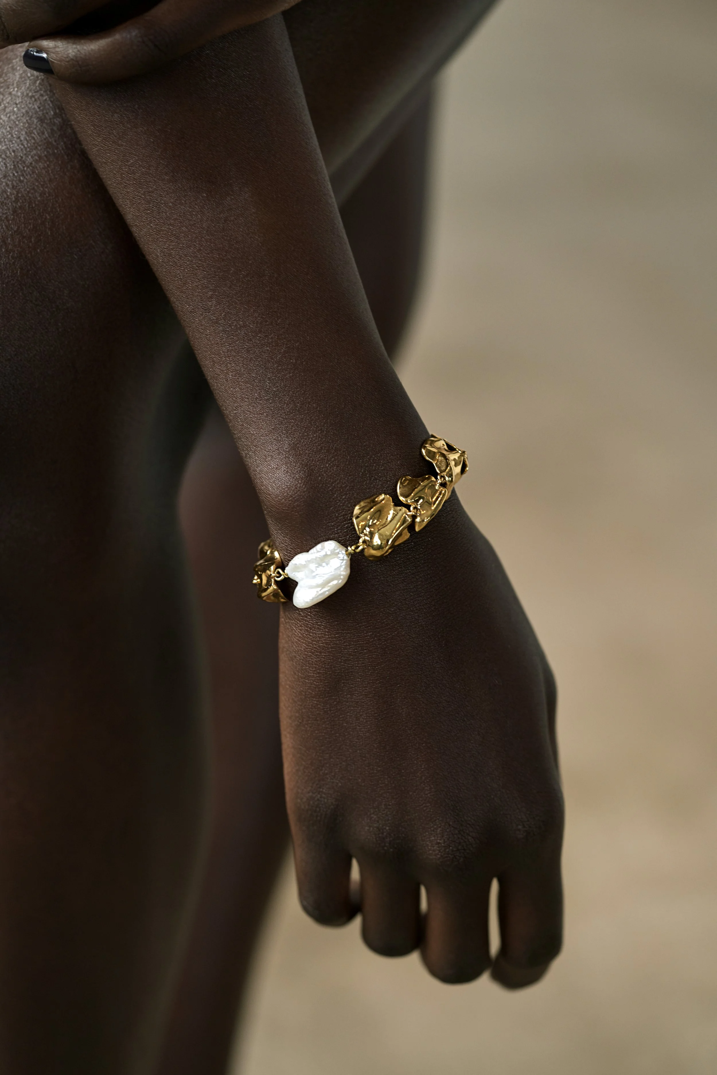 Sterling-King-New-York-Gold-Vertebrae-Pearl-Bracelet.jpg