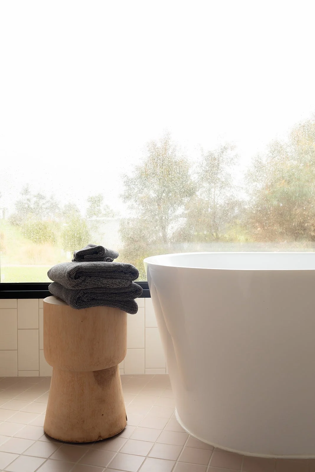A photo of a bathtub with a view in a boutique accomodation in Daylesford.