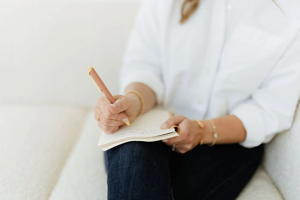 Kelly writes in her notebook about Career Static and Career Authorship