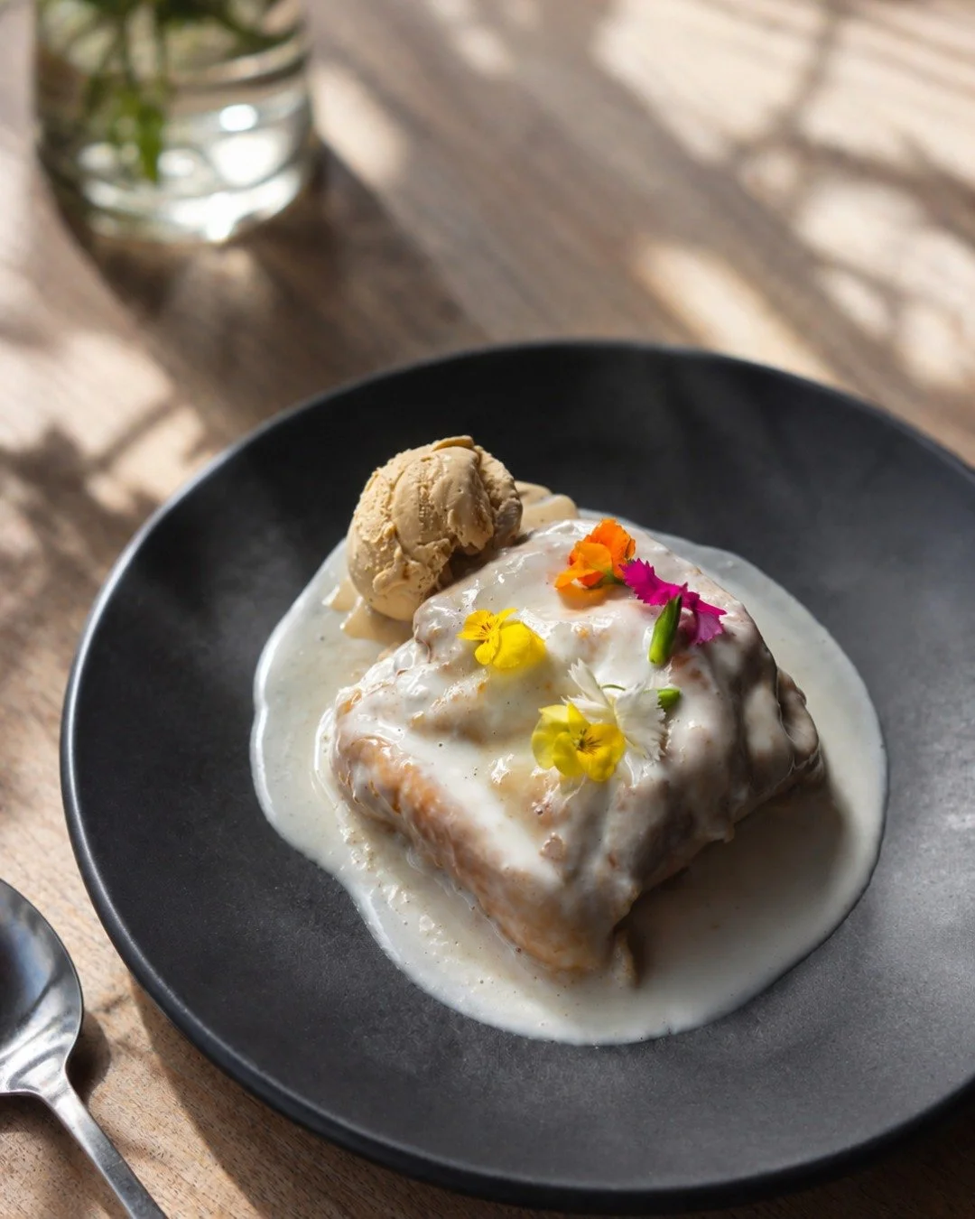 Our GM gave this one an 11/10 at menu tasting.
Banana and caramel filled bun, coconut cream sauce, and caramel ice cream.
We'll let you be the judge.