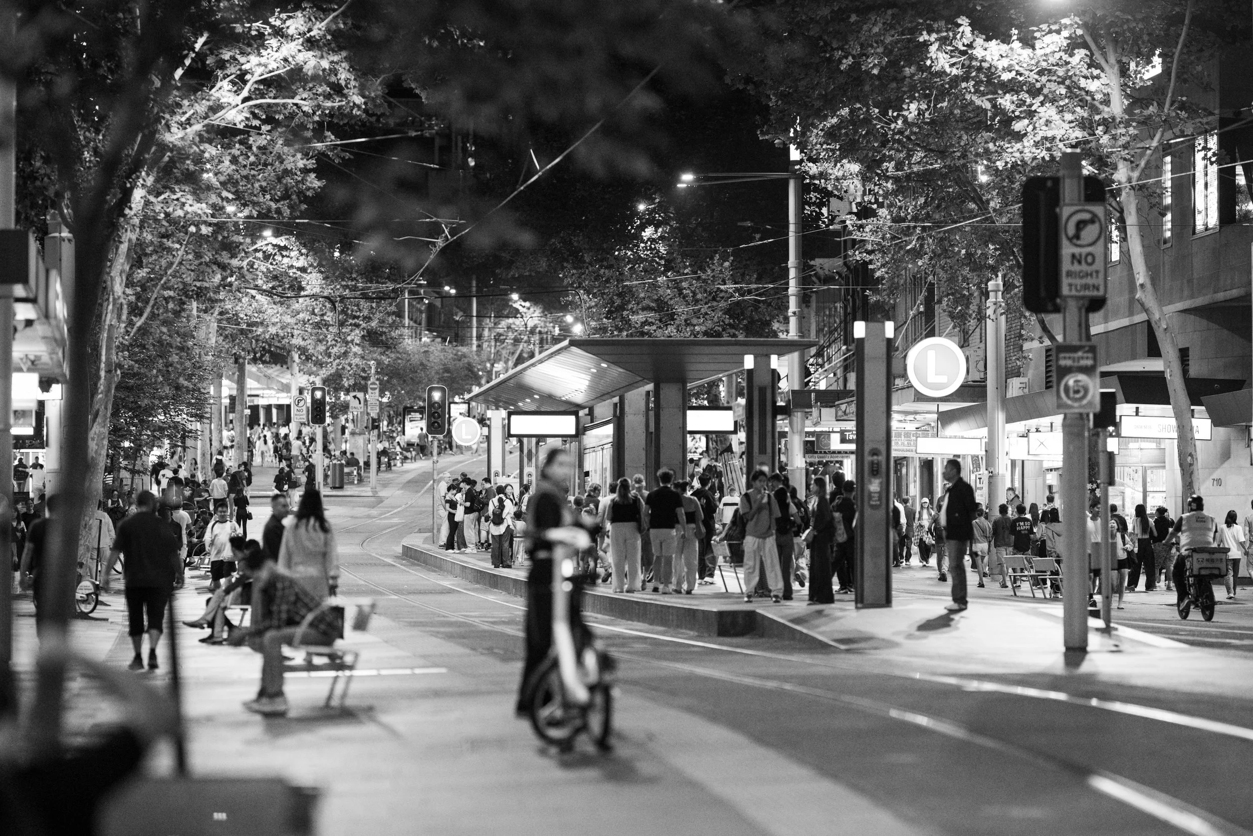 SYD_4969-2-night-street-photography-travelling-shoes-when-all-doors-close-become-a-doorway-sydney-australia-january-2026-sepa-sama-black-and-white-photography-walking-as-knowledge.jpg