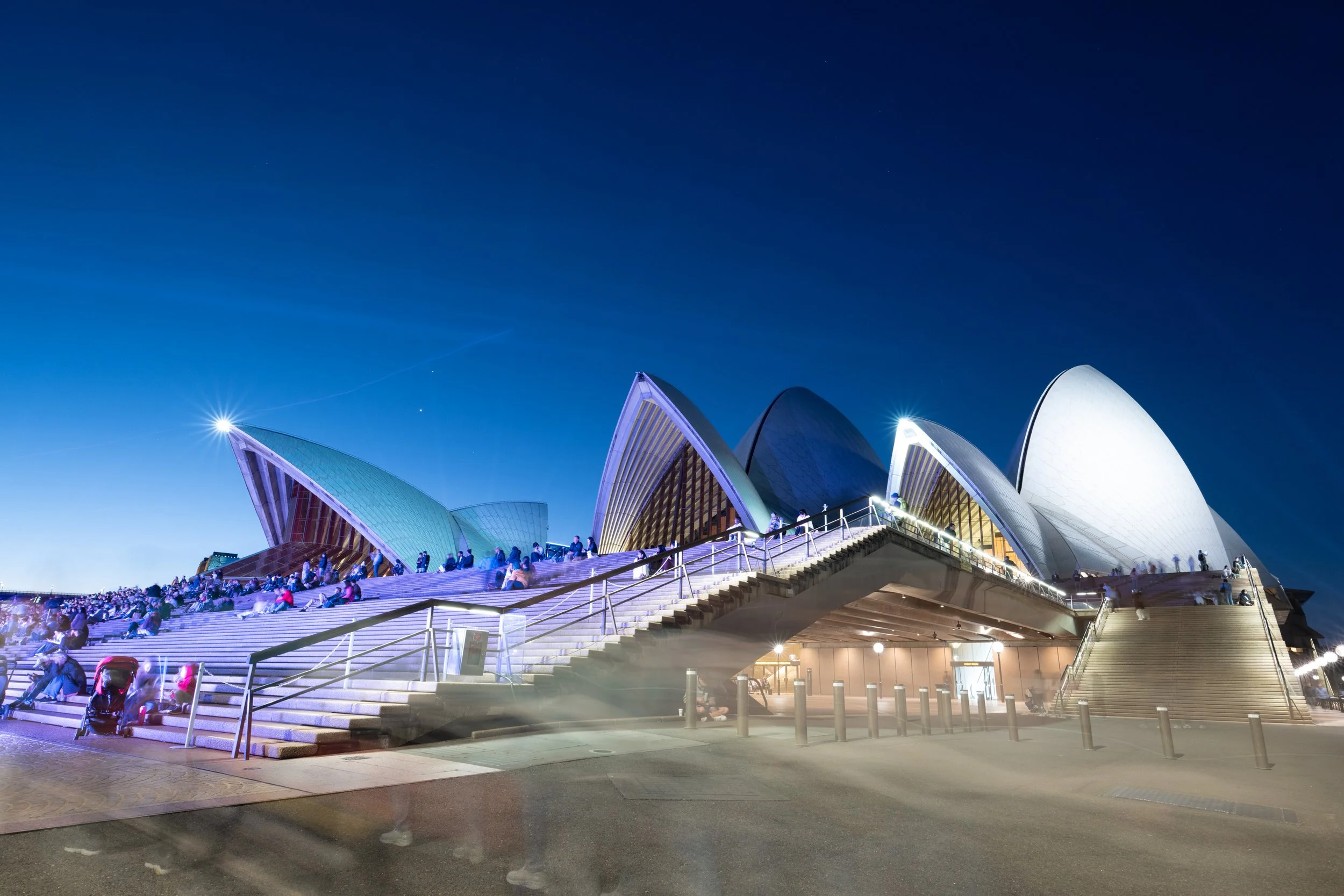 Sydney Opera House at night during Vivid Sydney, photographed as public space, architectural photography, walking-based artistic research, and urban study in Sydney, Australia.