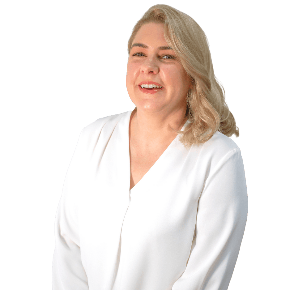 A smiling woman with blonde hair wearing a white top.