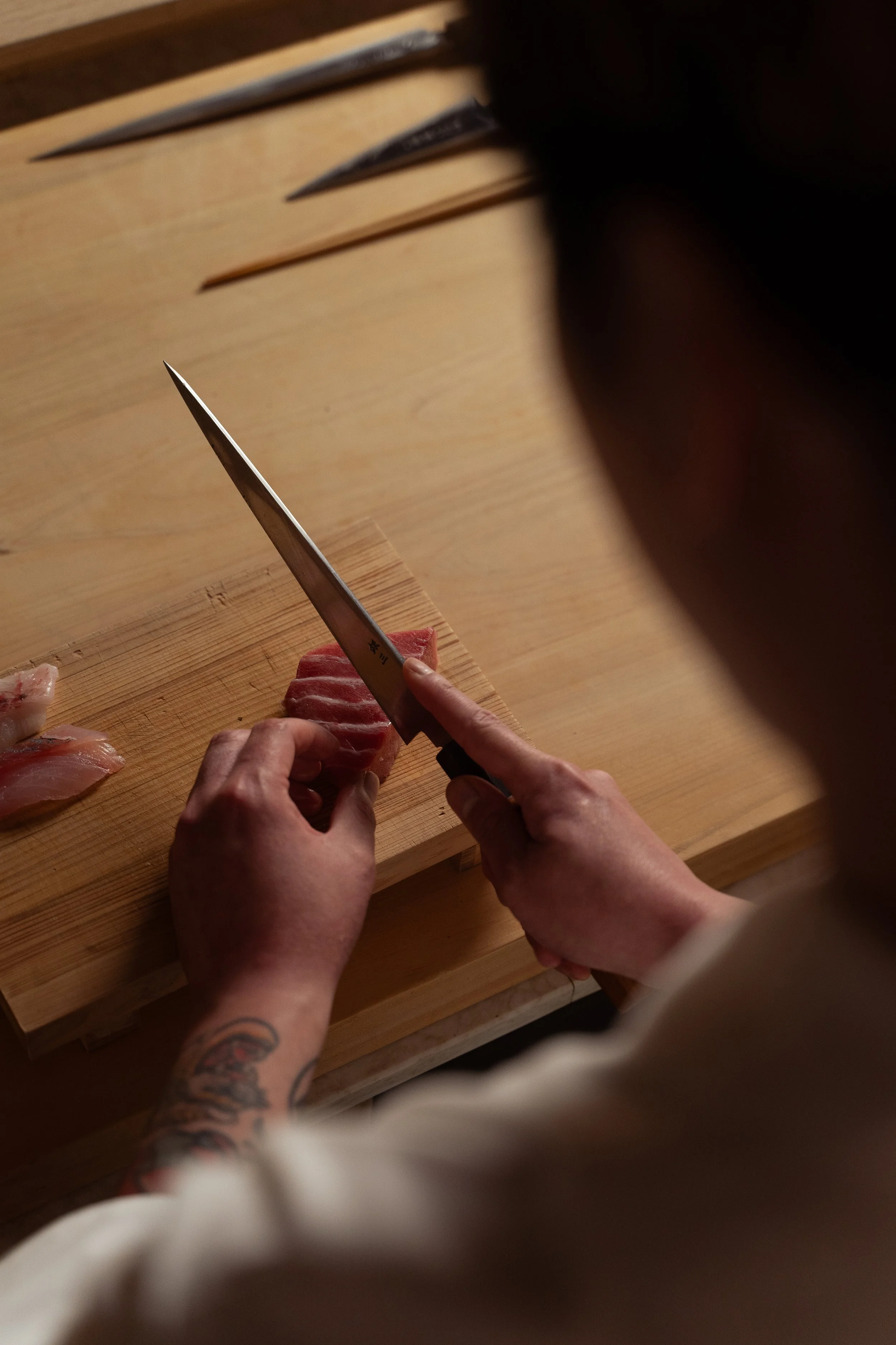 Chef Toaki cutting tuna