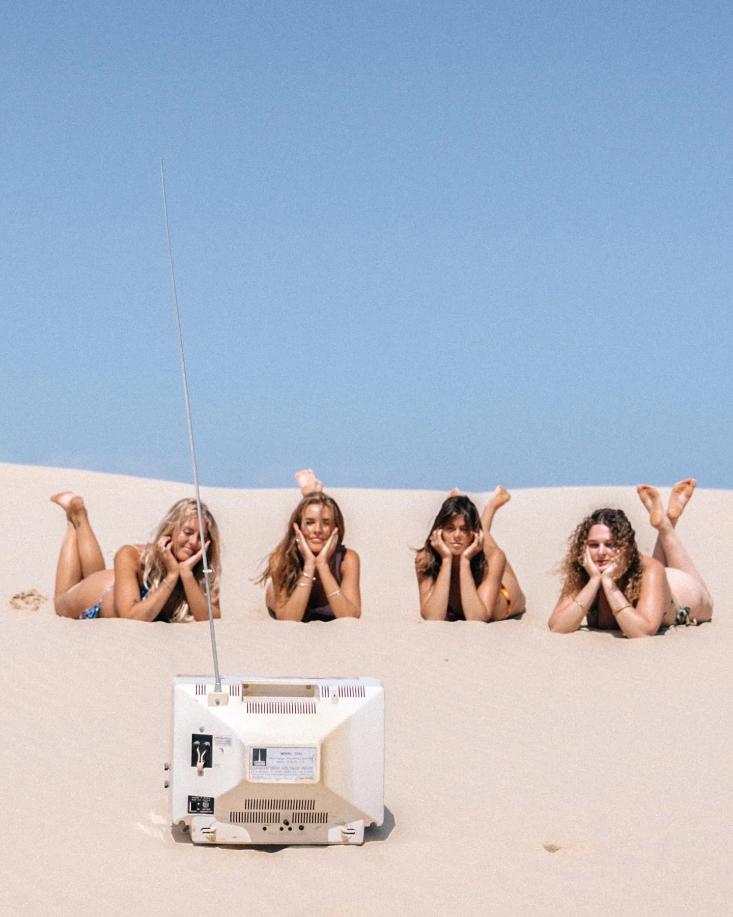 𝐀𝐥𝐦𝐨𝐬𝐭 𝐄𝐥𝐬𝐞𝐰𝐡𝐞𝐫𝐞 | 𝐒𝐭𝐨𝐫𝐲 𝐈𝐈𝐈

This chapter introduces interruption. A signal in the sand.
 Four bodies gathered around something that doesn&rsquo;t belong there.

The television hums quietly against the landscape, a fragment of