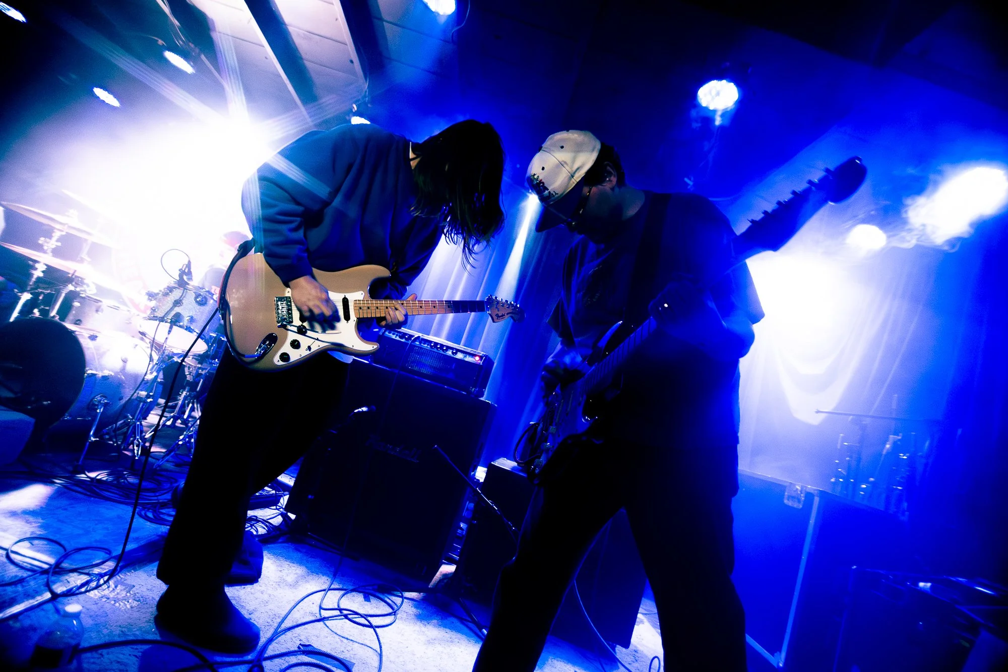 Money, Money, Money:

DENTON, TEXAS — Tanner Watkins, singer, and Kaden Salisbury, lead guitarist of alternative rock band Money, close out the first song of their set on Jan. 16 at Rubber Gloves Rehearsal Studio in Denton. Hailing from Oklahoma City