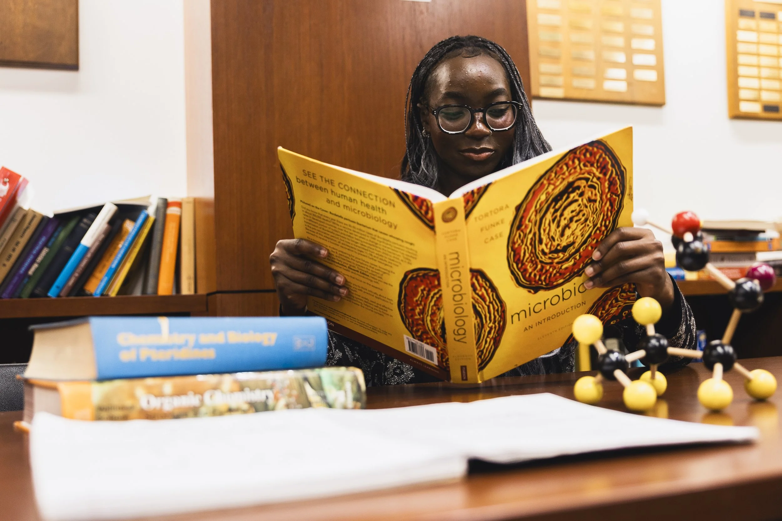 WORK HARD, STUDY HARDER: Junior Lola Popoola studies in the Chemistry Building Study Room at UNT on April 20. Originally from Houston, Popoola moved to Denton by herself for college and is majoring in medical laboratory sciences.
