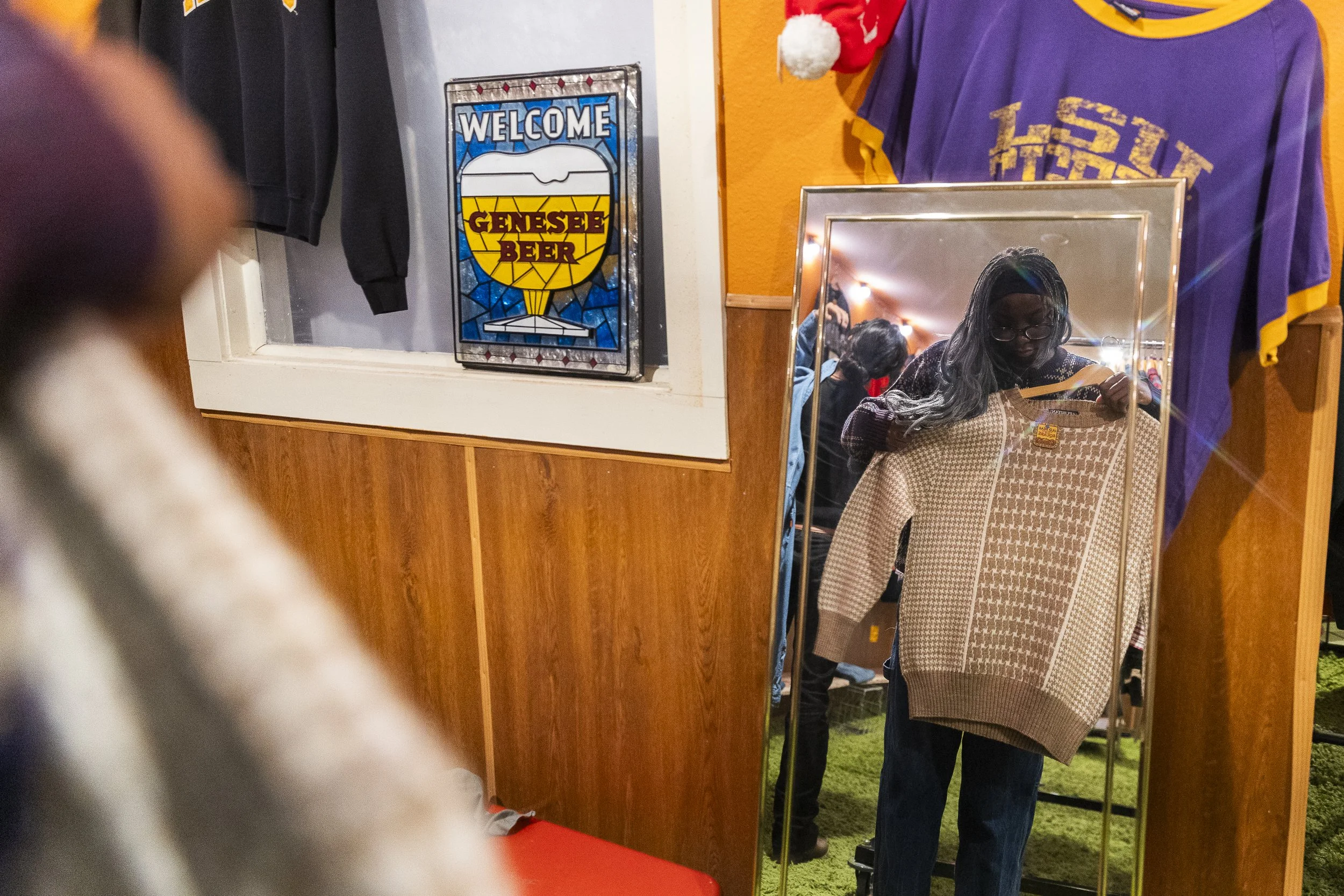 LETTIN' LOOSE: Junior Lola Popoola shops for clothes at Old Bear Vintage in Denton on April 20. Since most of her time is spent studying, she often decompresses by thrifting and going to concerts.