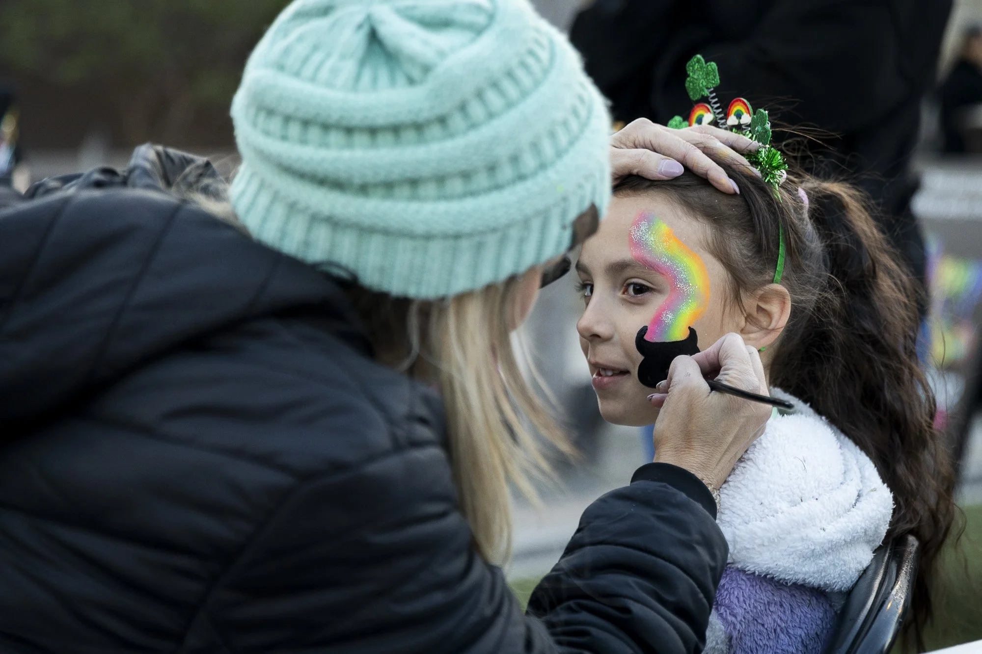Lucky Lucy: Lucy Santana celebrates her eighth birthday by getting her face painted at Grandscape in The Colony on March 17. Given that she was born on St. Patrick’s Day, her parents chose her name because it sounds similar to the word “lucky.”