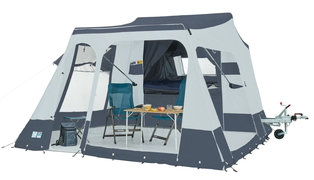 Jamet Compact gray and white camping tent with a screened front entrance, set up on a plain background. The tent has outdoor chairs, a small table with food and drinks, and a trailer attached to it.