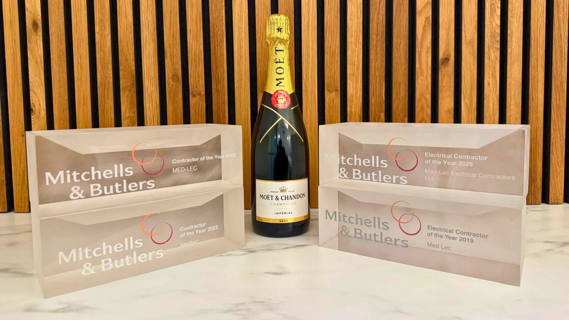 Medlec's four Mitchells and Butlers awards, Electrical Contractor of the Year 2019 and 2026 and Contractor of the Year 2022 and 2023