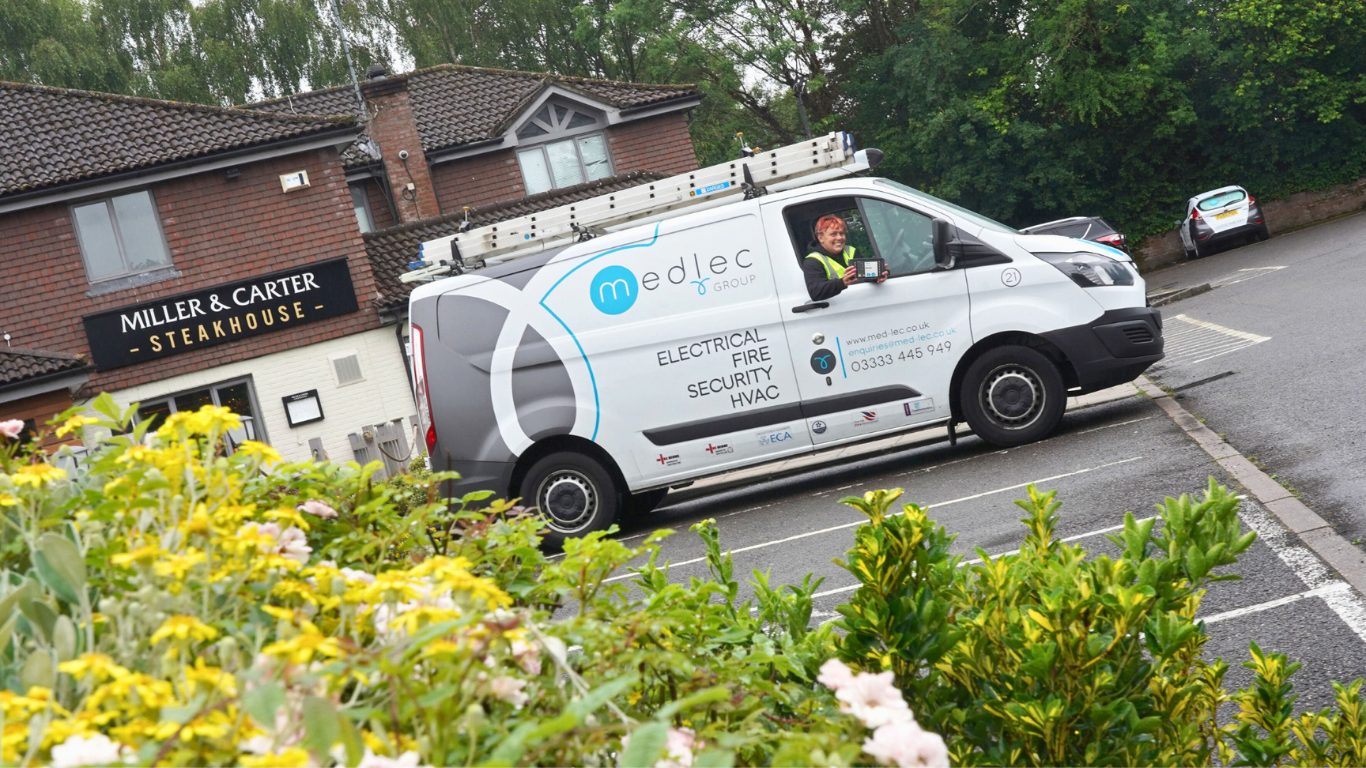 Medlec van outside a pu b after finishing a planned maintenance job