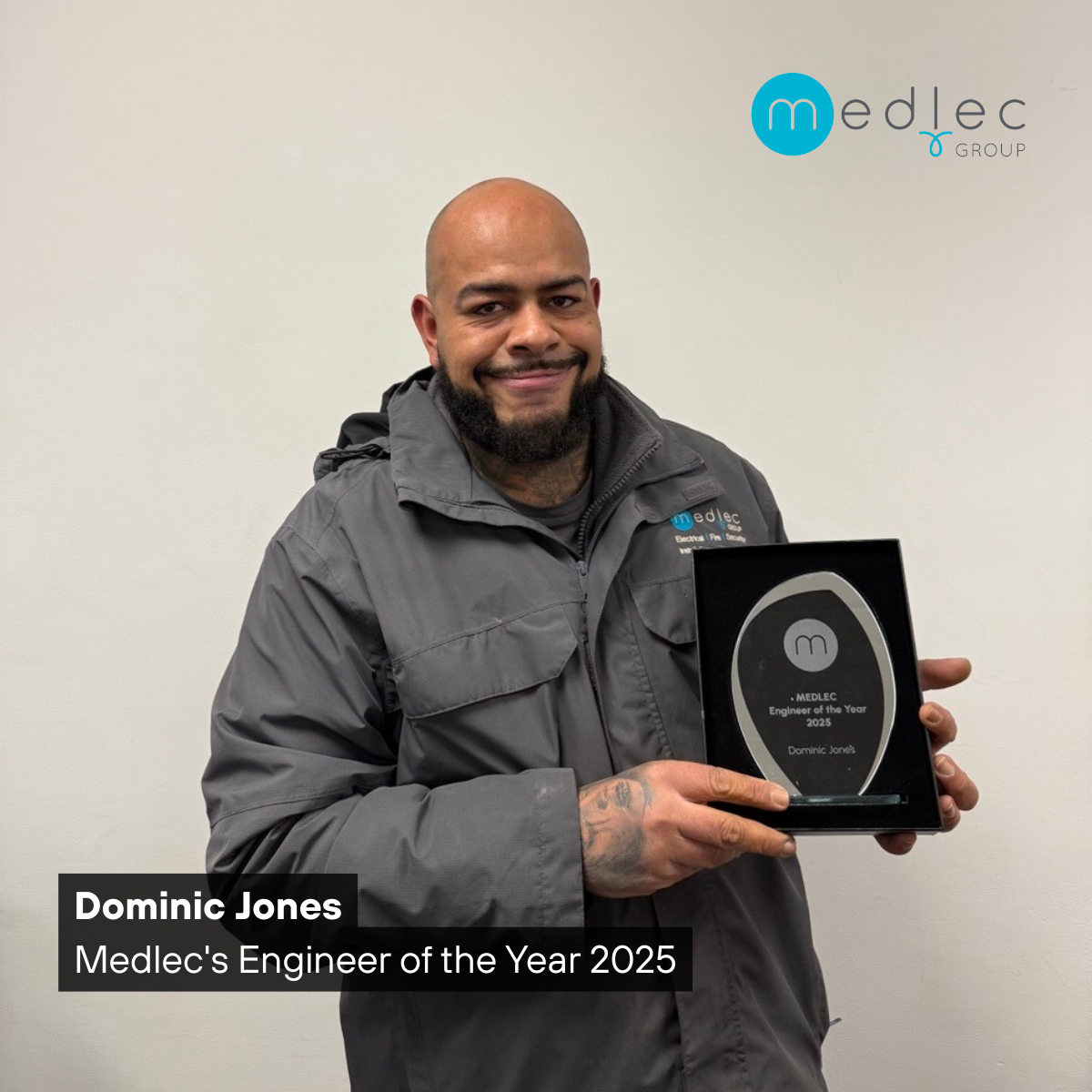 Photo of Dominic Jones holding his trophy for Medlec's Engineer of the Year 2025