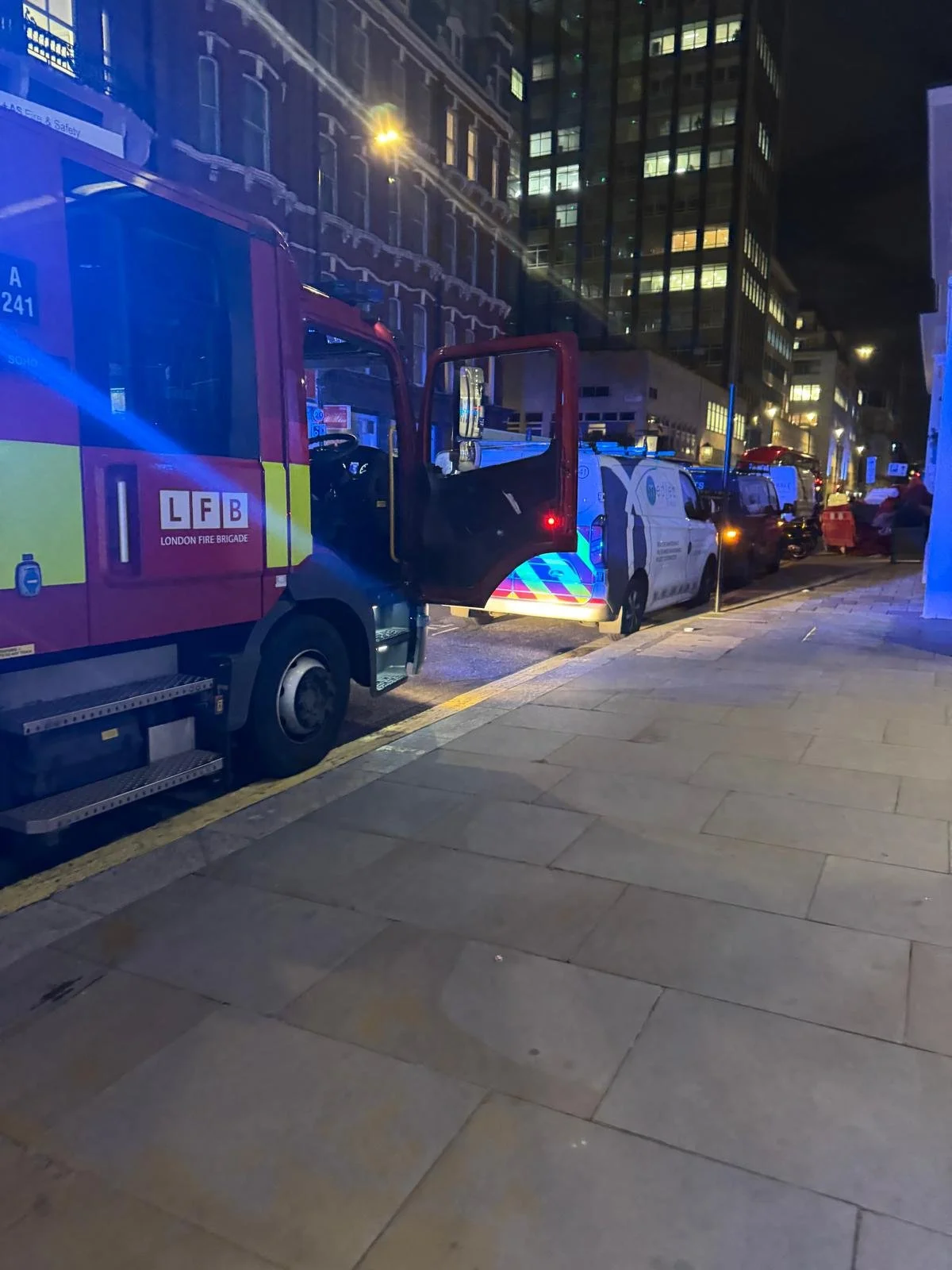 Image: London Fire Brigade helping at All Bar One in London to remove the awning which had fallen down in winds